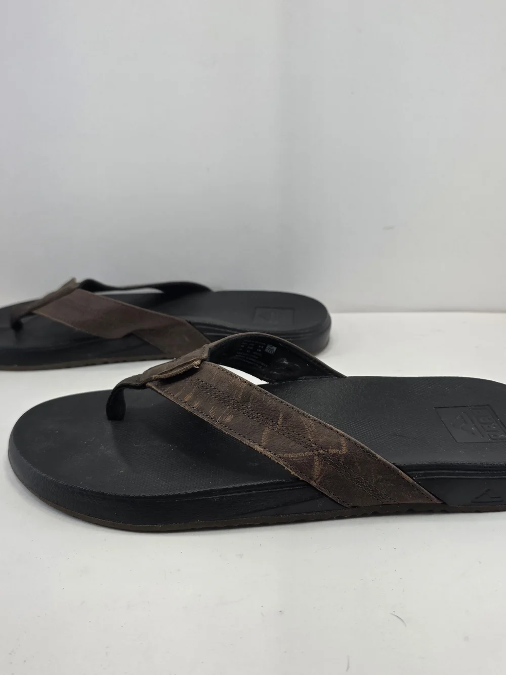 Reef Men's Black Footbed Brown Strap Flip Flop Sandals